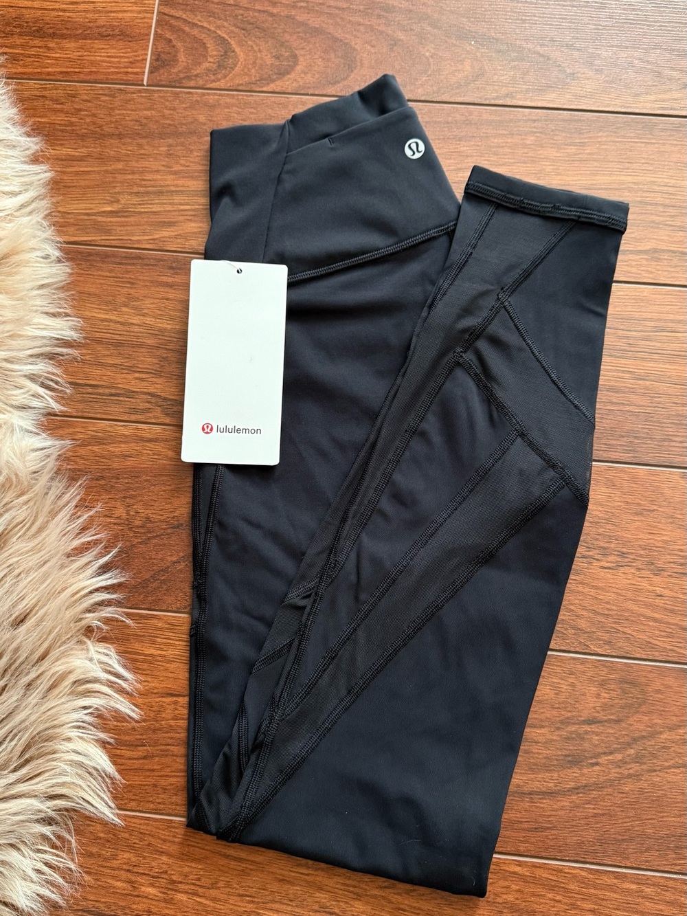Lululemon size 6 black leggings 7/8 with diagonal mesh panels
Brand new with tag